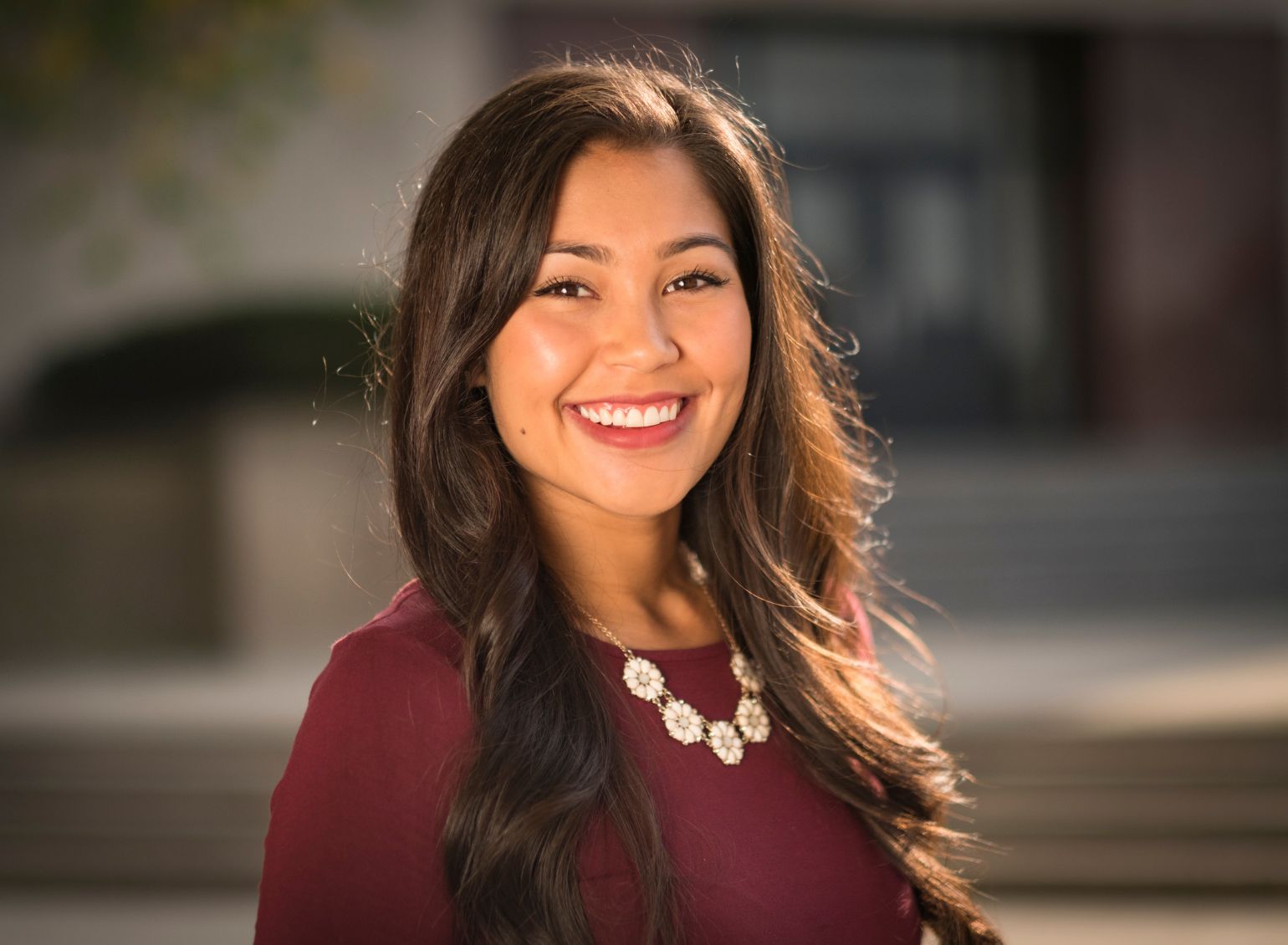 A transfer student smiles.